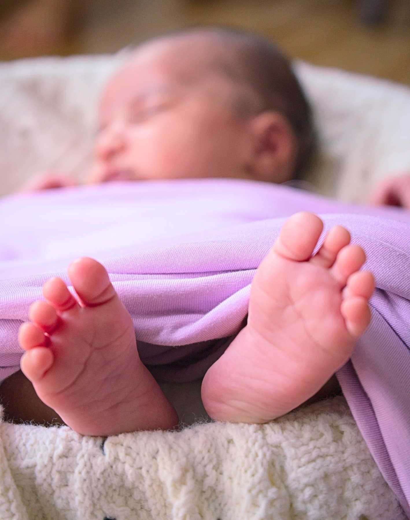 Newborn feet and lavender wrap edited in LightCraft