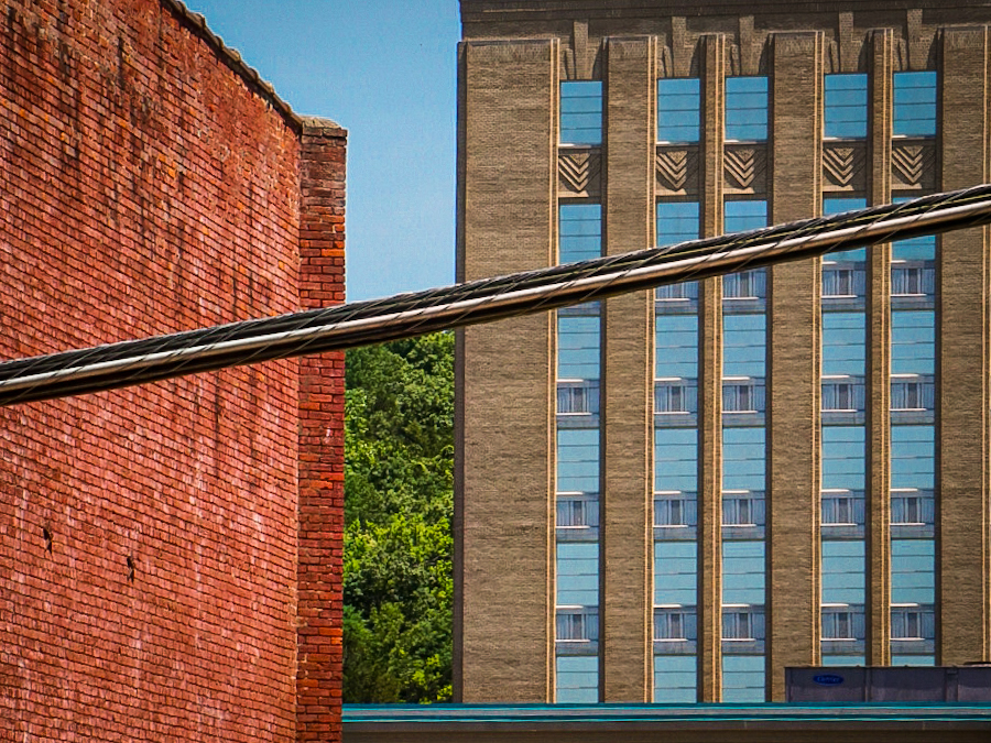 Brick facade and art-deco detail on an old utility structure.